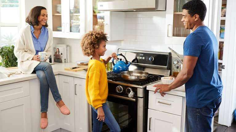 photo of family in kitchen